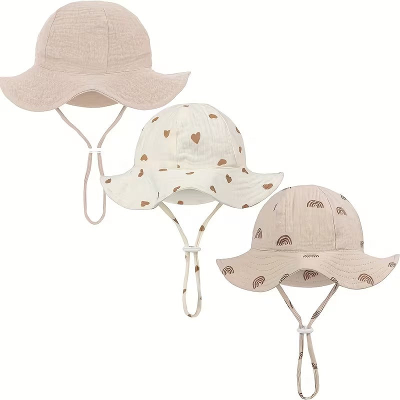 Sombreros de muselina para bebé Hello Mellow en beige liso, corazones y arcoíris